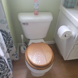 Immaculate job re-installing toilet with all new hardware after bathroom was painted.