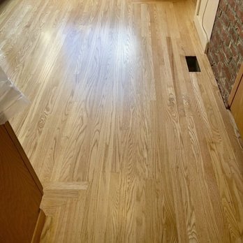 Swirsding's Floor Service - After.  Three coats of industrial hard wear polyurethane.  The job took 3 days with virtually no dust. - Flooring Near Me