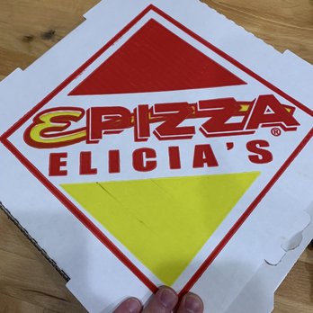 Hampton Hill pizza - a hand holding a pizza box - Pizza Near Me - Saint Louis, Missouri Hampton Hill pizza - a hand holding a pizza box - Pizza Near Me - Saint Louis, Missouri