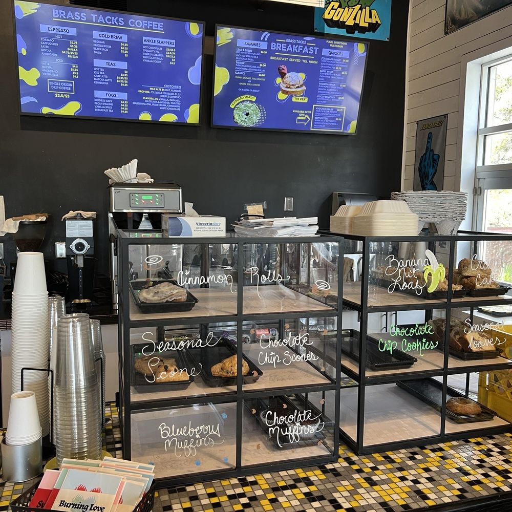 Brass Tacks Coffee - Counter area with danishes and the menu above. - Coffee & Tea Near Me - Jacksonville, Florida Brass Tacks Coffee - Counter area with danishes and the menu above. - Coffee & Tea Near Me - Jacksonville, Florida