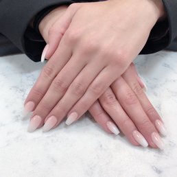 This was done with acrylic power and two weeks later I still have every single nail on and not one is lifted or chipped.