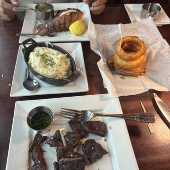 Sinners Steakhouse - Entrees and sides. You can't even see the filet mignon on the surf & turf plate - Steakhouses Near Me - Point Pleasant Beach, New Jersey Sinners Steakhouse - Entrees and sides. You can't even see the filet mignon on the surf & turf plate - Steakhouses Near Me - Point Pleasant Beach, New Jersey
