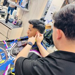 Born Barbers - Raúl, the charismatic manager, drafting his next artful design....