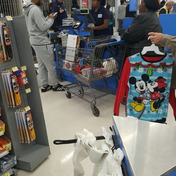Walmart Supercenter - This is  a pic of the people she helped. With 2 cart full of stuff. The Christmas Pj was all we were buying. Rude - Department Stores Near Me - Antioch, California