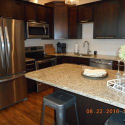 Hms Companies - A recently renovated designer kitchen in one of homes on 131 Cedar, Kalamazoo.
