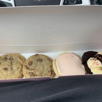 Crumbl - Naperville - Four pack of cookies; milk chocolate chip, semi sweet chocolate chip, pink frosted sugar and brownie sundae. - Bakeries Near Me - Naperville, Illinois