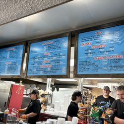 Dave's BBQ - Crew preparing food for customers, everyone was very happy to be there