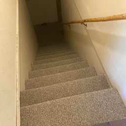 a staircase leading to a second floor a staircase leading to a second floor