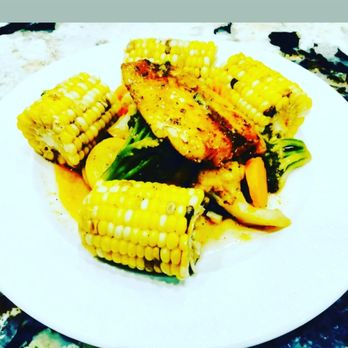 Randell's Creations Catering Service - Pan seared swai fillet fish over steamed vegetable blend and corn on the cob - Party & Event Planning Near Me Randell's Creations Catering Service - Pan seared swai fillet fish over steamed vegetable blend and corn on the cob - Party & Event Planning Near Me