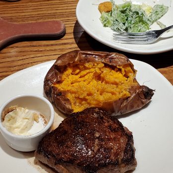 Outback Steakhouse - 8oz Sirloin (med) Sweet Potato and Cesar Salad, Ice tea and their brown bread - Steakhouses Near Me - Houston, Texas Outback Steakhouse - 8oz Sirloin (med) Sweet Potato and Cesar Salad, Ice tea and their brown bread - Steakhouses Near Me - Houston, Texas