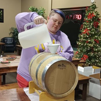 High Mark Distillery - Pouring alcohol into the barrel for Rum to set for 18month to mature in the Bourbon barrel - Distilleries Near Me - Reno, Nevada High Mark Distillery - Pouring alcohol into the barrel for Rum to set for 18month to mature in the Bourbon barrel - Distilleries Near Me - Reno, Nevada