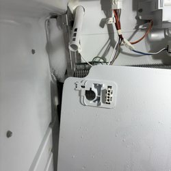 Mountain Maytag - Closeup of ice blocking cold air from freezer to refrigerator.