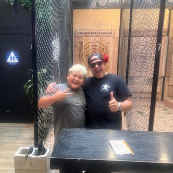 State Street Axe Club - My grandson and the owner - Axe Throwing Near Me - Santa Barbara, California