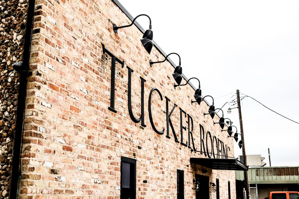 Slide of Tucker Roofing Systems