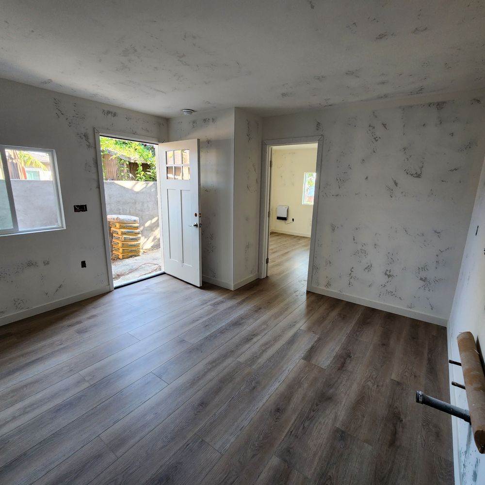 SavOn Flooring - empty room with wood floors - Flooring Near Me - Carlsbad, California SavOn Flooring - empty room with wood floors - Flooring Near Me - Carlsbad, California