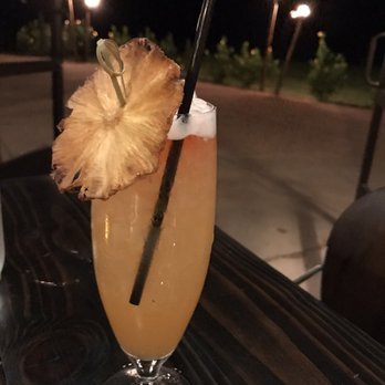 Taverna - Savoy garnished with dehydrated pineapple. YUM and you can eat the garnish. - Cocktail Bars Near Me - Kapalua, Hawaii Taverna - Savoy garnished with dehydrated pineapple. YUM and you can eat the garnish. - Cocktail Bars Near Me - Kapalua, Hawaii