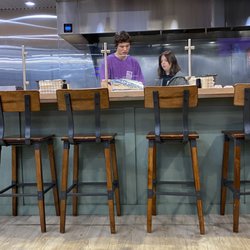 Tin Roof Tacos - Bar seating in front of the kitchen. Everything was very clean.
