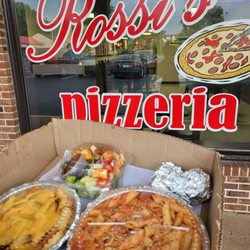 Rossi's Pizza - Cheese Fries, Penne alla vodka, Side Salad & Garlic Knots.