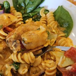 Shrimp, artichoke and spinach with fusilli pasta with an amazing red pepper cream sauce