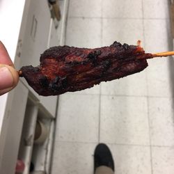 This is there chicken on a stick it's burned