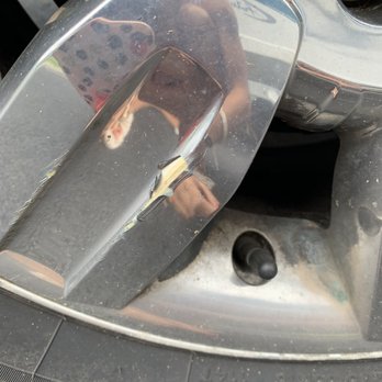 Burdick Ford - scraped chrome peeling off of wheel - Car Dealers Near Me - Central Square, New York