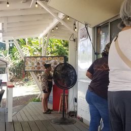 Covered deck with the food truck open for business. Covered deck with the food truck open for business.