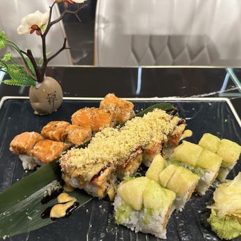 Machi Sushi Hibachi - left to right: cajun salmon roll, izumi roll, kiss of fire roll - Sushi Bars Near Me - Affton, Missouri Machi Sushi Hibachi - left to right: cajun salmon roll, izumi roll, kiss of fire roll - Sushi Bars Near Me - Affton, Missouri