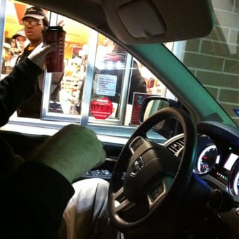 McDonald's - a man driving a car with a cup of coffee in his hand - Fast Food Near Me - Hope, Arkansas McDonald's - a man driving a car with a cup of coffee in his hand - Fast Food Near Me - Hope, Arkansas