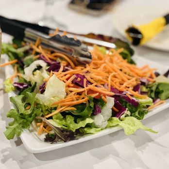 Aria Restaurant - a plate of salad and a glass of orange juice - Persian/Iranian Near Me - San Marcos, California Aria Restaurant - a plate of salad and a glass of orange juice - Persian/Iranian Near Me - San Marcos, California