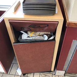 McDonald's - This place was and is a mess! Garbage everywhere. Garbage cans full. Ice open and exposed. The driptray a mess! Shame on you.