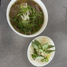 Steak and Brisket pho with fresh herbs Steak and Brisket pho with fresh herbs