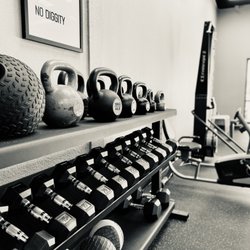 Grit Strength and Physical Therapy - Heavy dumbbells, kettlebells and heavy slam balls. This isn't your traditional Physical Therapy Practice.