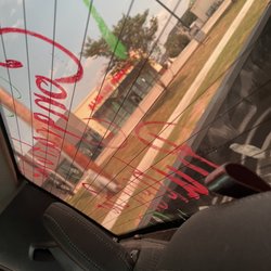 Tidal Wave Auto Spa - Back window not scrubbed by first attendant