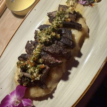 Isla Caribbean Cuisine - D- CHURRASCO CON CHIMICHURRI, ACOMPANADO DE UN MAJADO DE YUCA Y AJO ASADO - Caribbean Near Me - Syracuse, New York Isla Caribbean Cuisine - D- CHURRASCO CON CHIMICHURRI, ACOMPANADO DE UN MAJADO DE YUCA Y AJO ASADO - Caribbean Near Me - Syracuse, New York