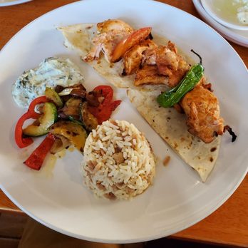 Selda Mediterranean - Chicken shish with tzatziki, grilled vegetables, and rice pilaf - Bars Near Me - Dallas, Texas Selda Mediterranean - Chicken shish with tzatziki, grilled vegetables, and rice pilaf - Bars Near Me - Dallas, Texas