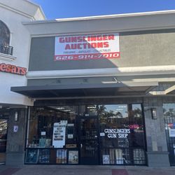 Gunslinger Gun Shop - New sign so you can find the shop.