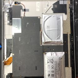 Tattwa Networks - Swollen Microsoft Surface battery that needed replacing