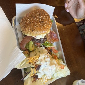 Angus Grill - The queso burger with a side salad. - Burgers Near Me - Wilmington, North Carolina