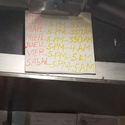 Cristian's Hotdog - Hours posted in truck