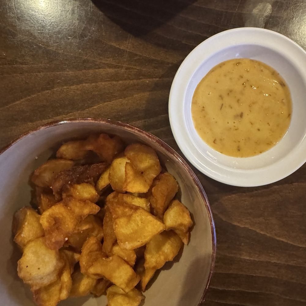 Crispy Potatoes with a delicious calamansi banglong aioli dipping sauce Crispy Potatoes with a delicious calamansi banglong aioli dipping sauce