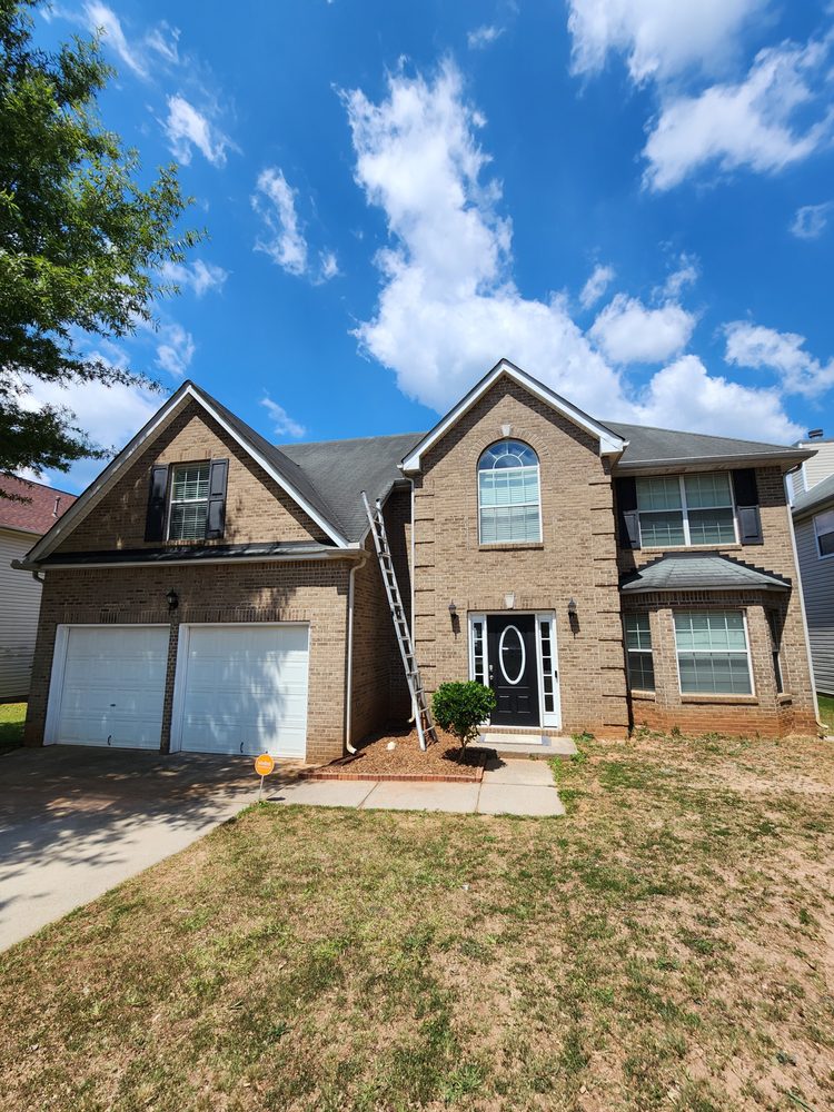 Slide of The Roofing Specialists