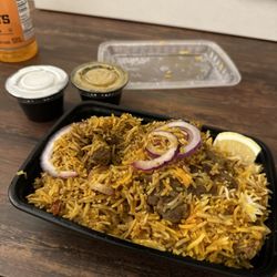 The Chozhas Authentic Indian Restaurant - Goat Dum Biryani
