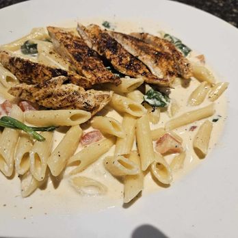 Piesanos Stone Fired Pizza - Millhopper - blackened chicken with penne, tomatoes, and spinach. - Pizza Near Me - Gainesville, Florida