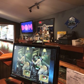 Backyard - TVs with the NFL package. - Bars Near Me - Stowe, Vermont