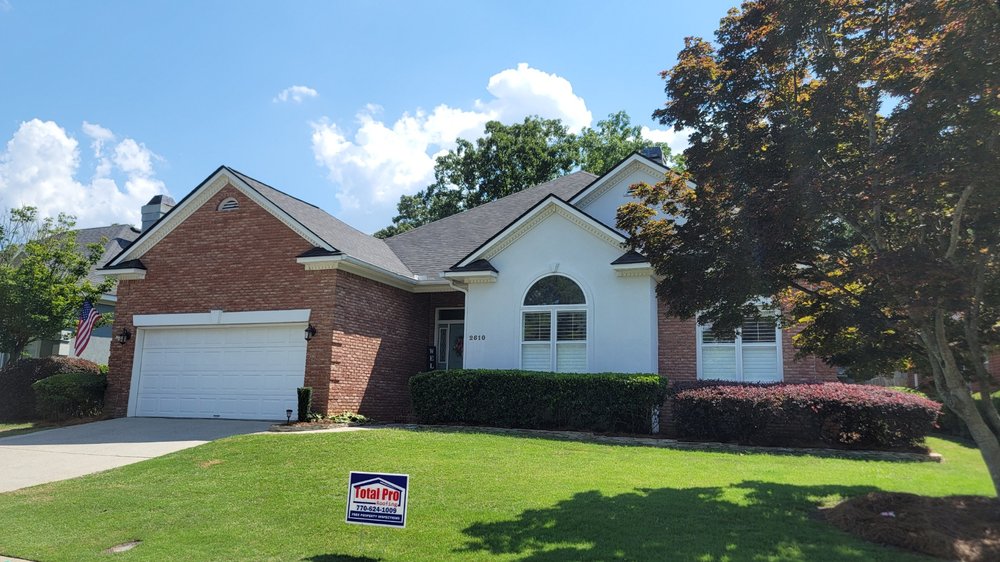 Slide of Total Pro Roofing