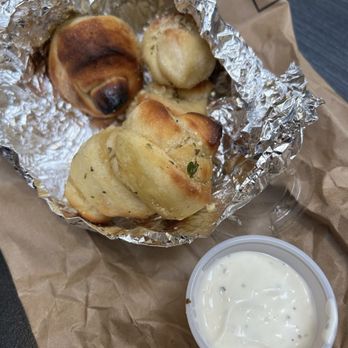 Italian Village Pizza - garlic knots with ranch - Pizza Near Me - Lansing, Michigan Italian Village Pizza - garlic knots with ranch - Pizza Near Me - Lansing, Michigan