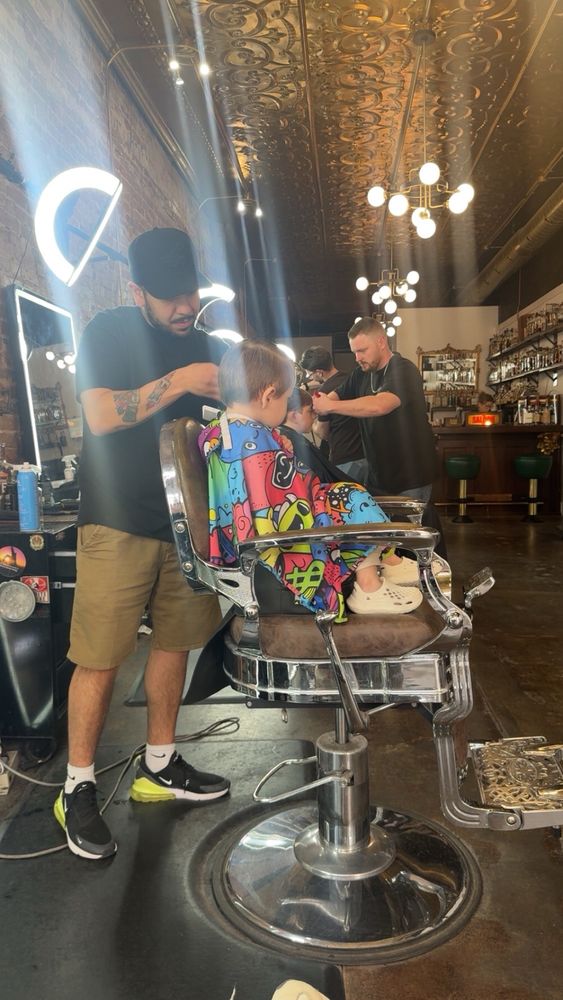 Metric Barber And Shop Logo