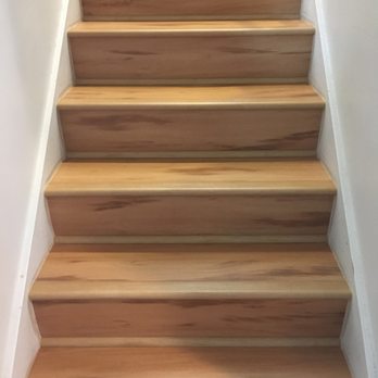 Payless Carpet & Tile - a wooden staircase - Flooring Near Me - San Juan Capistrano, California Payless Carpet & Tile - a wooden staircase - Flooring Near Me - San Juan Capistrano, California