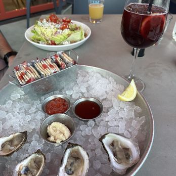 Stir - Prince Edward Island oysters, wedge - Cocktail Bars Near Me - Knoxville, Tennessee