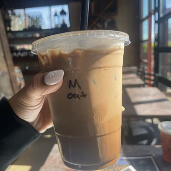 Ristrettos Coffee & Wine - 16oz iced oatmilk mocha - Coffee & Tea Near Me - Maple Valley, Washington Ristrettos Coffee & Wine - 16oz iced oatmilk mocha - Coffee & Tea Near Me - Maple Valley, Washington